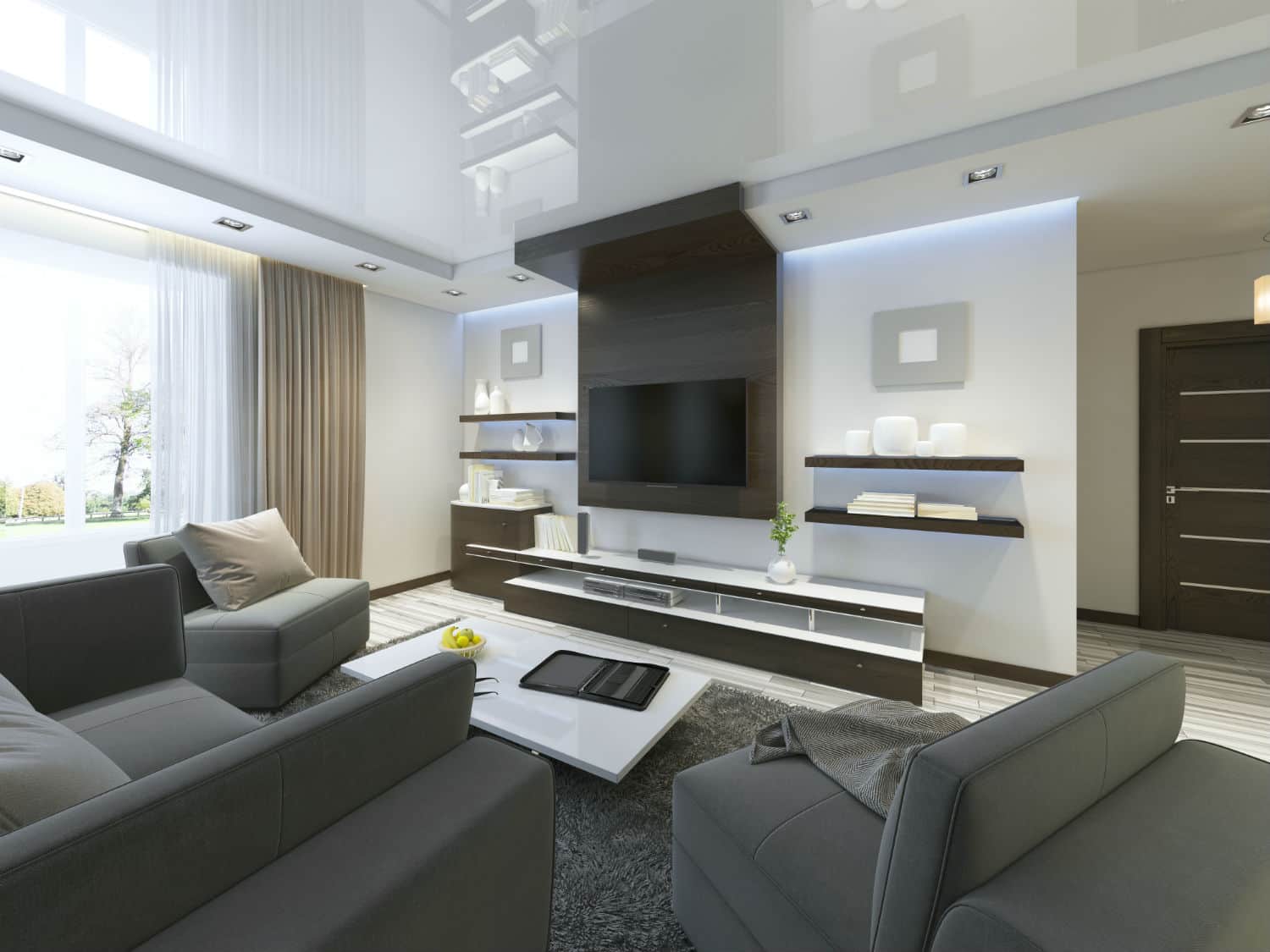 A beautiful living room with a mounted TV and sound system